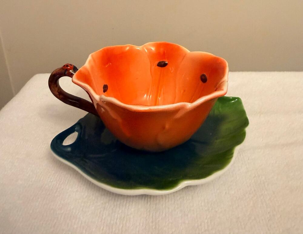 NWOT Teatime Surprise Ceramic Flower Cup & Leaf Saucer Set with ladybug accents